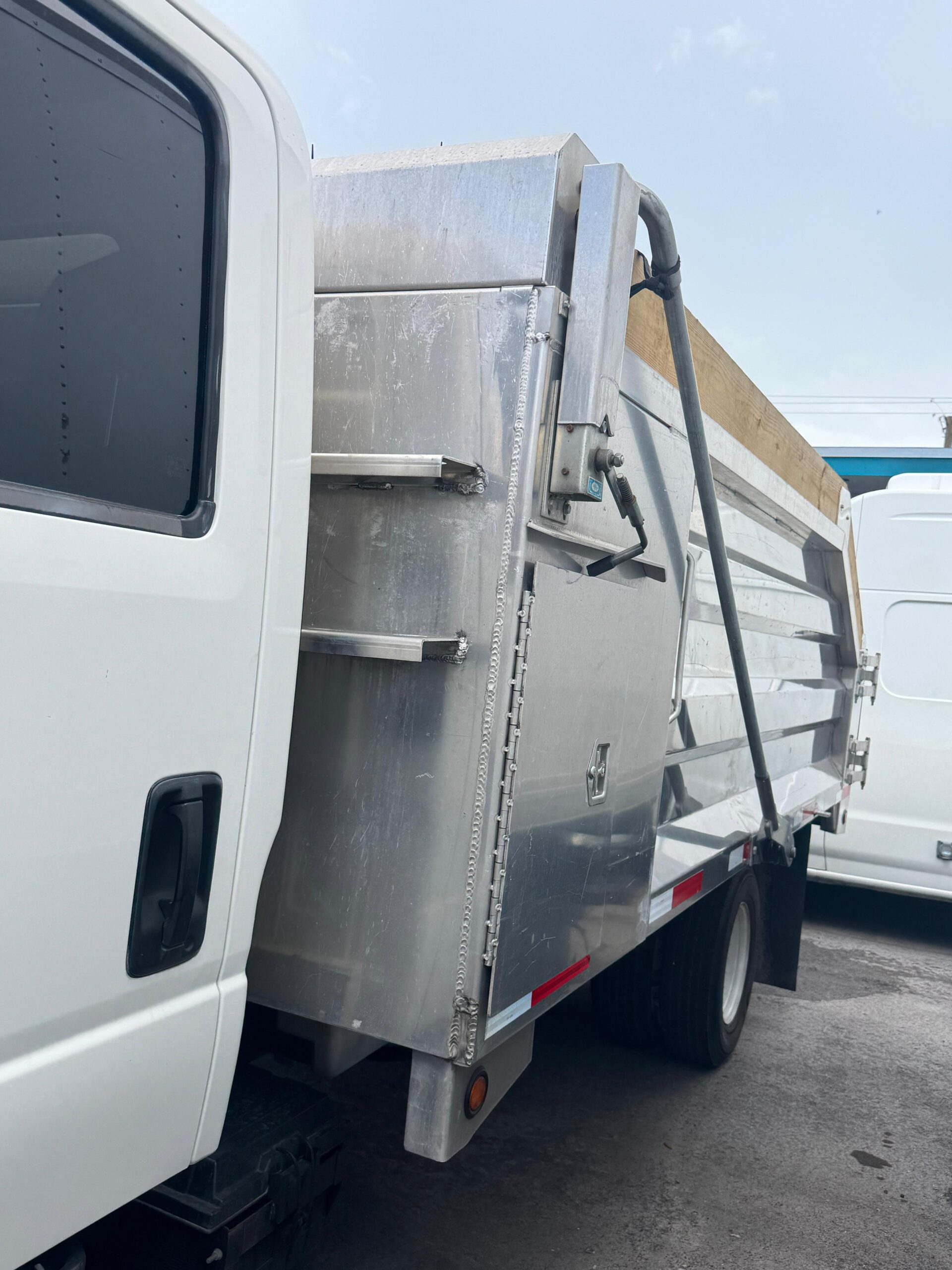 2022-isuzu-npr-hd-30k-miles-dump-truck-outside